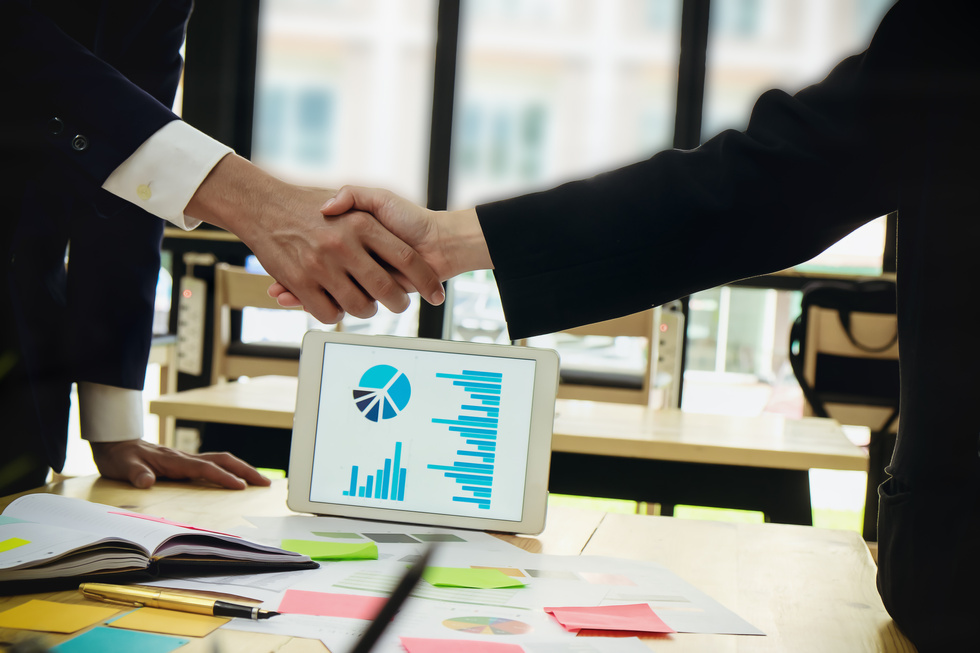 Close up of Businessmen Shaking Hands